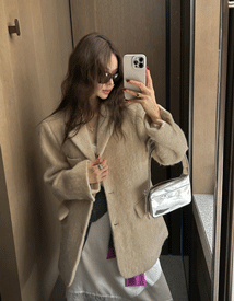 Mogul over coat