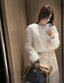 Ridge feather crop blouse