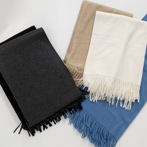 Solid wool muffler