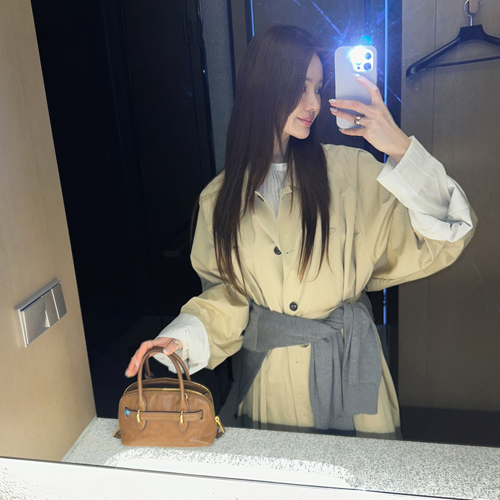 Raber over trench coat