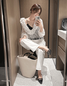 Silly frill neck blouse