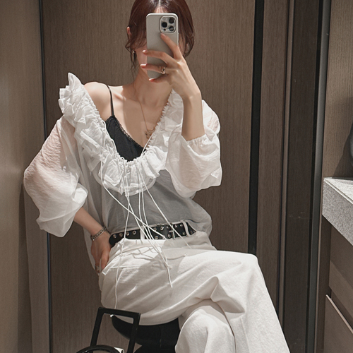 Silly frill neck blouse