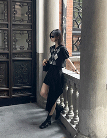 Raccoon argyle collar knit