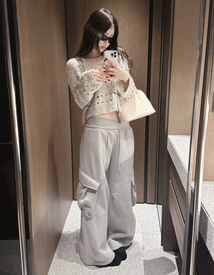 Cove banding over cargo pants